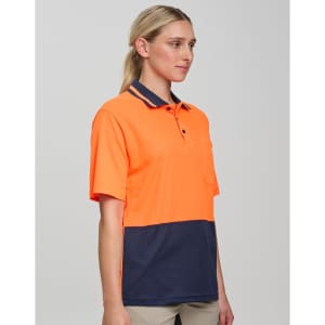 A safety polo shirt featuring high-visibility orange and navy blue colours, with a collar and a pocket.