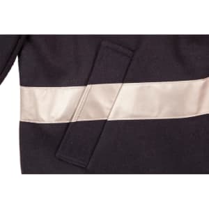 A blue safety jacket featuring reflective 3M tape, designed for visibility in work environments.