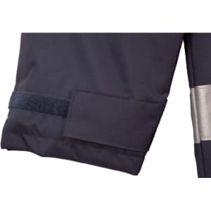 A dark navy safety jacket with reflective 3M tape and a velcro patch on the sleeve. Features branding.