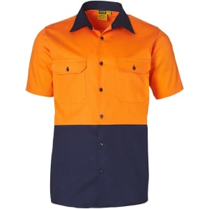 A short-sleeved cotton work shirt featuring a bright orange top half and a navy blue bottom half, with two chest pockets and a logo.