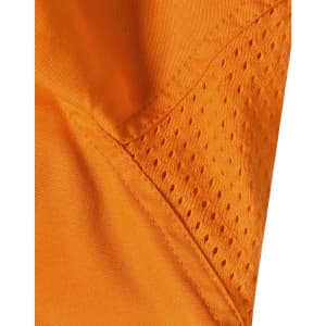 An orange safety shirt featuring mesh panels for breathability, designed for workwear applications.