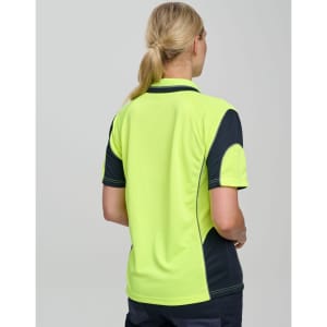 A high-visibility polo shirt featuring bright yellow-green and navy blue colours, with a branding logo.