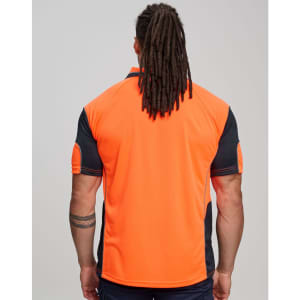 An orange and navy polo shirt with a logo, featuring a mini waffle texture and short sleeves.