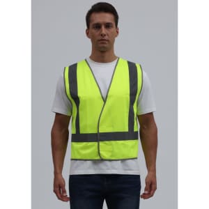 A bright yellow safety vest featuring reflective strips, worn by a model against a plain background.