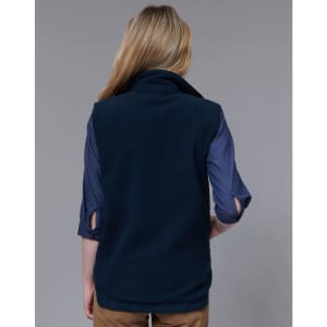 A navy reversible safety vest with a snug collar, shown from the back, paired with a blue shirt underneath.