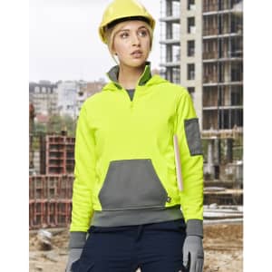 A bright yellow and grey two-tone hoodie featuring a front pocket and a logo, worn by a person in a construction setting.