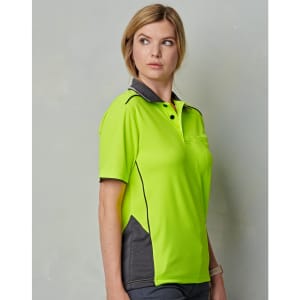 A high-visibility lime green polo shirt with grey accents and a collar, featuring a logo on the chest.