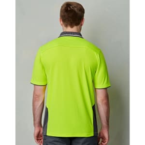 A bright hi-visibility lime green polo shirt with charcoal accents and a logo on the back.