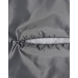 A close-up of a grey quilted fabric with a zip closure, highlighting the texture and stitching details.
