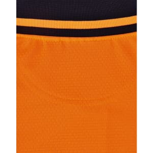 A close-up view of a unisex hi-vis polo shirt featuring orange and black colours, with a ribbed texture and a logo.