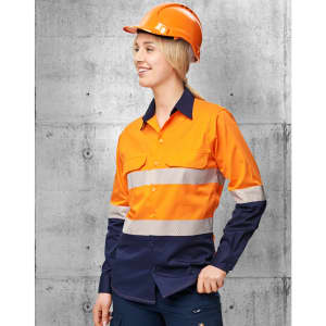 A high-visibility long sleeve safety shirt in orange and navy, featuring segmented reflective tape, with a hard hat.