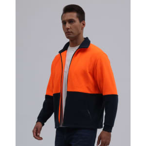 A polar fleece full zip jacket in bright orange and navy, featuring a collar and side pockets. It has a logo.