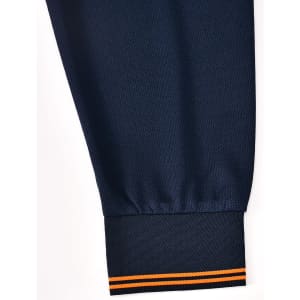 A navy blue long-sleeve polo shirt featuring an orange striped cuff and a logo or branding on the fabric.
