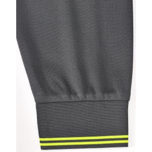 A long-sleeve grey polo shirt featuring a segmented hem with a yellow accent stripe and a logo.