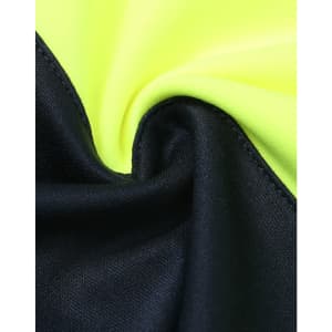 A close-up of a fabric featuring fluorescent yellow and navy blue sections, with a smooth texture and a logo.