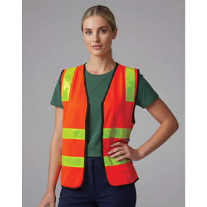 A hi-visibility safety vest in bright orange with reflective yellow stripes worn by a model.