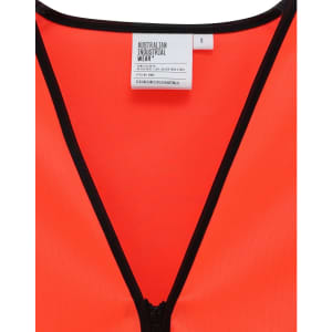 A bright orange safety vest featuring a zippered front and contrasting black trim, with a tag visible inside.