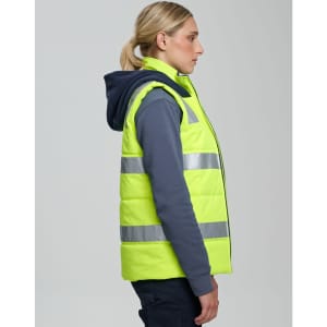 A unisex hi-vis hooded puffer vest in bright yellow with reflective stripes, worn over a navy shirt.