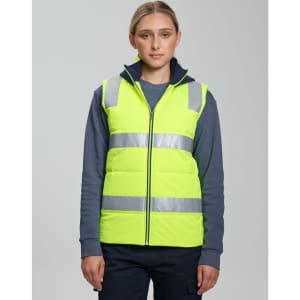 A unisex high visibility hooded puffer vest in bright yellow with reflective strips, worn by a model.