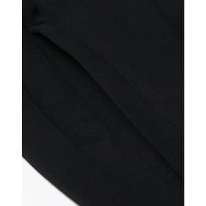 A close-up of black unisex Airlayered CVC sweatpants, featuring smooth fabric with visible seams and a branding logo.