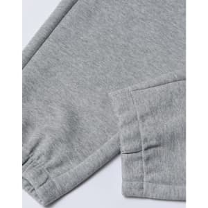 A pair of grey unisex sweatpants featuring an elasticated cuff and a logo on the waistband.