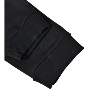 Black poly/cotton terry sweat pants with ribbed cuffs and a logo. Suitable for casual comfort.