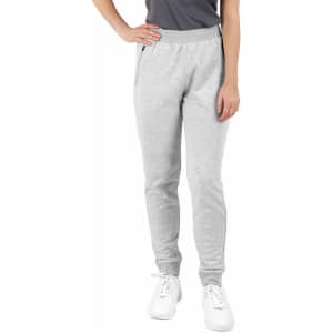 Grey poly/cotton terry sweat pants with a fitted design and pockets, featuring a logo on the waistband.