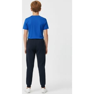 Kids' navy poly/cotton terry sweat pants displayed from the back, paired with a blue T-shirt. Features a logo.