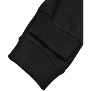 Black poly/cotton terry sweat pants featuring ribbed cuffs and a soft fabric finish. Includes a logo on the waistband.