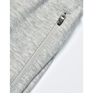 A close-up of grey kids' poly/cotton terry sweat pants featuring a zip pocket and soft fabric texture.