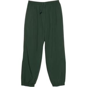 Dark green track pants with an elastic waistband and a drawstring, featuring two side pockets and a logo.