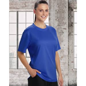 A woman wearing a blue short sleeve tee with a relaxed fit, featuring a logo on the front.