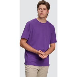 A purple semi-fitted men's cotton t-shirt displayed on a model, featuring short sleeves and a simple design.