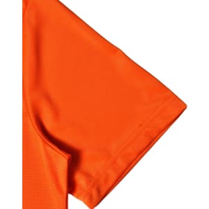 An orange short-sleeved performance t-shirt with a textured fabric and a logo on the design.