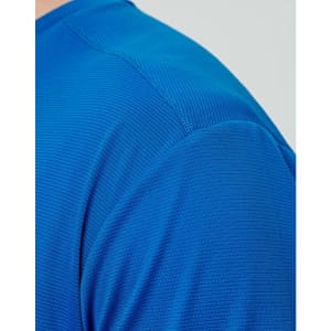 A close-up of a men's ultra lightweight performance T-shirt in vibrant blue, featuring a textured fabric.