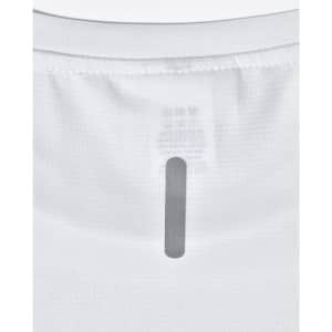 A close-up of a white men's lightweight performance T-shirt showing the neckline and tag area, with a branding label.