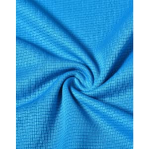 A textured fabric in bright blue, showcasing a grid pattern suitable for lightweight performance wear.