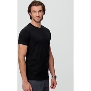 A black men's premium cotton tee displayed on a model, featuring a classic crew neckline and short sleeves.