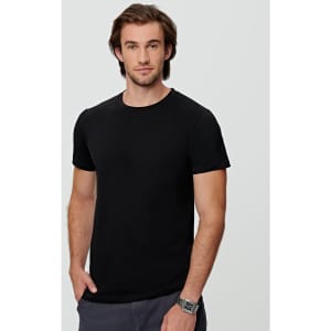 A black men's premium cotton tee displayed on a model, featuring a round neck and short sleeves.