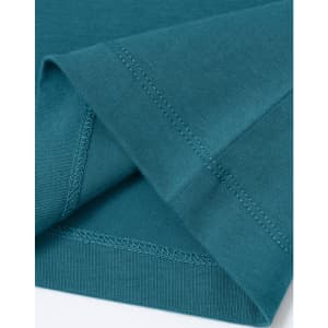 A close-up of a teal men's premium cotton t-shirt, highlighting the fabric and stitching details.