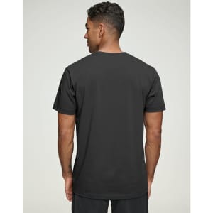 A black premium cotton short-sleeve tee shirt displayed on a model from the back. The shirt features a logo.