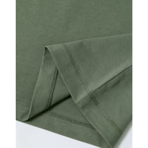 A green premium cotton short sleeve tee shirt, featuring neatly stitched hems and a soft fabric texture.