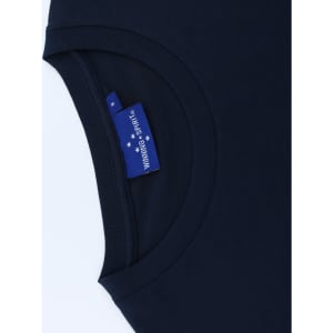 A navy blue premium cotton short sleeve tee shirt featuring a tag with branding.