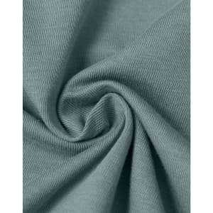 A close-up of soft, premium cotton fabric in a sage green colour, showcasing its texture and quality.