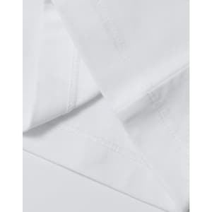 A white cotton tee with detailed stitching, featuring a relaxed fit and short sleeves. It has a logo.