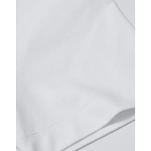 A close-up of a white premium cotton short sleeve tee shirt featuring a stitched hem and a logo.