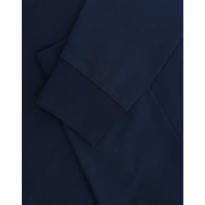 A navy blue long-sleeve T-shirt with folded sleeves and a subtle logo.