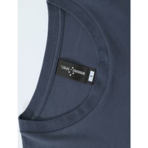 A navy blue long-sleeve tee shirt with a round neckline and a label inside the collar.