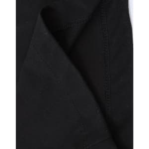 A close-up of a black premium cotton long-sleeve tee shirt, highlighting the stitching and fabric texture.
