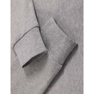 A grey long-sleeved cotton tee shirt featuring cuffed sleeves and a soft texture. It has a branding logo.